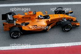23.01.2006 Barcelona, Spain,  Pedro de la Rosa (ESP), Test Driver, in the new McLaren MP4-21, also in orange - Formula One Testing, Circuit de Catalunya