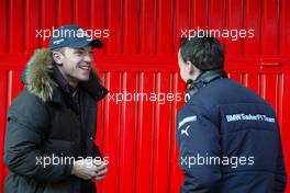 24.01.2006 Barcelona, Spain,  Robert Doornbos (NED), Test Driver, Red Bull Racing talks with Robert Kubica (POL), Test Driver, BMW Sauber F1 Team, share a joke - Formula One Testing, Circuit de Catalunya