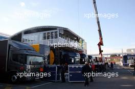 20.02.2006 Barcelona, Spain,  A brand new "motor home" for the technicians and engineers on the top of the trucks gets build up - Red Bull Racing