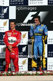 12.03.2006 Sakhir, Bahrain,  Michael Schumacher (GER), Scuderia Ferrari and Fernando Alonso (ESP), Renault F1 Team - Formula 1 World Championship, Rd 1, Bahrain Grand Prix, Sunday Podium