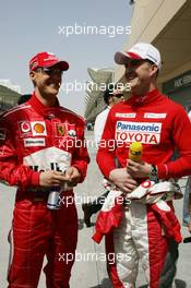 12.03.2006 Sakhir, Bahrain,  Michael Schumacher (GER), Scuderia Ferrari and Ralf Schumacher (GER), Toyota Racing - Formula 1 World Championship, Rd 1, Bahrain Grand Prix, Sunday