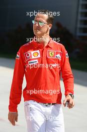 09.03.2006 Sakhir, Bahrain,  Michael Schumacher (GER), Scuderia Ferrari arrives at the track - Formula 1 World Championship, Rd 1, Bahrain Grand Prix, Thursday