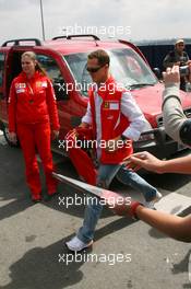 21.10.2006 Sao Paulo, Brazil,  Michael Schumacher (GER), Scuderia Ferrari, arrives at the circuit - Formula 1 World Championship, Rd 18, Brazilian Grand Prix, Saturday