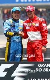 22.10.2006 Sao Paulo, Brazil,  Fernando Alonso (ESP), Renault F1 Team and Michael Schumacher (GER), Scuderia Ferrari - Formula 1 World Championship, Rd 18, Brazilian Grand Prix, Sunday