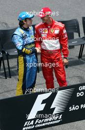 22.10.2006 Sao Paulo, Brazil,  Fernando Alonso (ESP), Renault F1 Team and Michael Schumacher (GER), Scuderia Ferrari - Formula 1 World Championship, Rd 18, Brazilian Grand Prix, Sunday