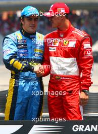 22.10.2006 Sao Paulo, Brazil,  Fernando Alonso (ESP), Renault F1 Team and Michael Schumacher (GER), Scuderia Ferrari - Formula 1 World Championship, Rd 18, Brazilian Grand Prix, Sunday