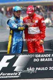 22.10.2006 Sao Paulo, Brazil,  Fernando Alonso (ESP), Renault F1 Team and Michael Schumacher (GER), Scuderia Ferrari - Formula 1 World Championship, Rd 18, Brazilian Grand Prix, Sunday