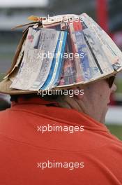 23.06.2006 Montreal, Canada,  A fan with a hat of Old race tickets - Formula 1 World Championship, Rd 9, Canadian Grand Prix, Friday