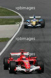 25.06.2006 Montreal, Canada,  Michael Schumacher (GER), Scuderia Ferrari, 248 F1 leads Giancarlo Fisichella (ITA), Renault F1 Team, R26 - Formula 1 World Championship, Rd 9, Canadian Grand Prix, Sunday Race