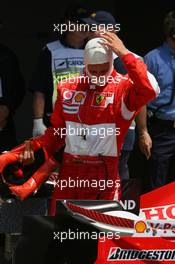 24.06.2006 Montreal, Canada,  Michael Schumacher (GER), Scuderia Ferrari looks at his rear wing - Formula 1 World Championship, Rd 9, Canadian Grand Prix, Saturday Qualifying