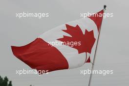 22.06.2006 Montreal, Canada,  Canadian Flag flies in the paddock - Formula 1 World Championship, Rd 9, Canadian Grand Prix, Thursday