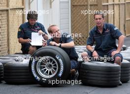22.06.2006 Montreal, Canada,  Red Bull Racing team members prepare their tyres for the weekend - Formula 1 World Championship, Rd 9, Canadian Grand Prix, Thursday
