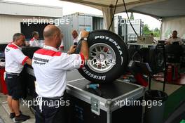 22.06.2006 Montreal, Canada,  Bridgestone tyre fitters prepare F1 tyres for the weekend - Formula 1 World Championship, Rd 9, Canadian Grand Prix, Thursday