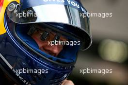 29.09.2006 Shanghai, China,  Red Bull Racing refueler, has a device infront of his eye inside his helmet - Formula 1 World Championship, Rd 16, Chinese Grand Prix, Friday