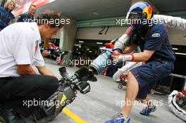 29.09.2006 Shanghai, China,  Red Bull Racing practice a fuel stop for the TV cameras - Formula 1 World Championship, Rd 16, Chinese Grand Prix, Friday