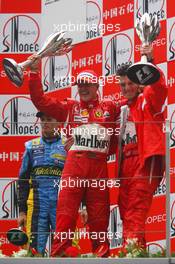01.10.2006 Shanghai, China,  Michael Schumacher (GER), Scuderia Ferrari and Chris Dyer (AUS), Scuderia Ferrari, Race Engineer - Formula 1 World Championship, Rd 16, Chinese Grand Prix, Sunday Podium