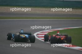 01.10.2006 Shanghai, China ** QIS, Quick Image Service ** October, Formula 1 World Championship, Rd 16, Chinese Grand Prix - Every used picture is fee-liable. - EDITORS PLEASE NOTE: QIS, Quick Image Service is a special service for electronic media. QIS images are uploaded directly by the photographer moments after the image has been taken. These images will not be captioned with a text describing what is visible on the picture. Instead they will have a generic caption indicating where and when they were taken. For editors needing a correct caption, the high resolution image (fully captioned) of the same picture will appear some time later on www.xpb.cc. The QIS images will be in low resolution (800 pixels longest side) and reduced to a minimum size (format and file size) for quick transfer. More info about QIS is available at www.xpb.cc - This service is offered by xpb.cc limited - c Copyright: xpb.cc limited  