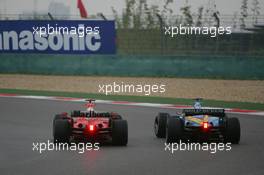 01.10.2006 Shanghai, China,  Michael Schumacher (GER), Scuderia Ferrari, 248 F1 overtakes Fernando Alonso (ESP), Renault F1 Team, R26 - Formula 1 World Championship, Rd 16, Chinese Grand Prix, Sunday Race