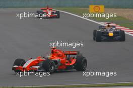 01.10.2006 Shanghai, China,  Tiago Monteiro (POR), Spyker MF1 Racing, Toyota M16 and Robert Doornbos (NED), Red Bull Racing, RB2 - Formula 1 World Championship, Rd 16, Chinese Grand Prix, Sunday Race