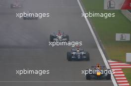 01.10.2006 Shanghai, China,  David Coulthard (GBR), Red Bull Racing, RB2 and Mark Webber (AUS), Williams F1 Team, FW28 Cosworth - Formula 1 World Championship, Rd 16, Chinese Grand Prix, Sunday Race