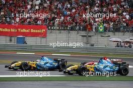01.10.2006 Shanghai, China,  Fernando Alonso (ESP), Renault F1 Team leads Giancarlo Fisichella (ITA), Renault F1 Team and Michael Schumacher (GER), Scuderia Ferrari - Formula 1 World Championship, Rd 16, Chinese Grand Prix, Sunday Race