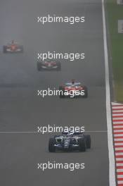 01.10.2006 Shanghai, China,  Nico Rosberg (GER), WilliamsF1 Team, FW28 Cosworth and Jarno Trulli (ITA), Toyota Racing, TF106  - Formula 1 World Championship, Rd 16, Chinese Grand Prix, Sunday Race