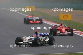 01.10.2006 Shanghai, China,  Rubens Barrichello (BRA), Honda Racing F1 Team, RA106 and Michael Schumacher (GER), Scuderia Ferrari, 248 F1 - Formula 1 World Championship, Rd 16, Chinese Grand Prix, Sunday Race