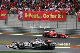 01.10.2006 Shanghai, China,  Pedro de la Rosa (ESP), McLaren Mercedes, MP4-21 leads Felipe Massa (BRA), Scuderia Ferrari, 248 F1 - Formula 1 World Championship, Rd 16, Chinese Grand Prix, Sunday Race