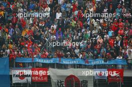 01.10.2006 Shanghai, China,  Fans in the grandstand - Formula 1 World Championship, Rd 16, Chinese Grand Prix, Sunday Race