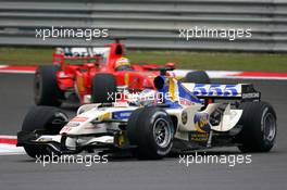 01.10.2006 Shanghai, China,  Jenson Button (GBR), Honda Racing F1 Team leads Felipe Massa (BRA), Scuderia Ferrari - Formula 1 World Championship, Rd 16, Chinese Grand Prix, Sunday Race