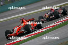01.10.2006 Shanghai, China,  Tiago Monteiro (POR), Spyker MF1 Racing, Toyota M16 and Scott Speed (USA), Scuderia Toro Rosso, STR01 - Formula 1 World Championship, Rd 16, Chinese Grand Prix, Sunday Race