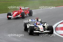 01.10.2006 Shanghai, China,  Rubens Barrichello (BRA), Honda Racing F1 Team and Michael Schumacher (GER), Scuderia Ferrari - Formula 1 World Championship, Rd 16, Chinese Grand Prix, Sunday Race