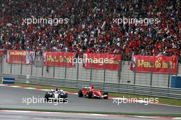 01.10.2006 Shanghai, China,  Rubens Barrichello (BRA), Honda Racing F1 Team leads Michael Schumacher (GER), Scuderia Ferrari - Formula 1 World Championship, Rd 16, Chinese Grand Prix, Sunday Race