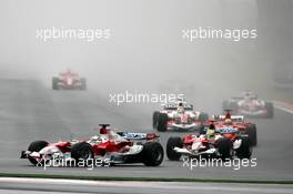 01.10.2006 Shanghai, China,  Start, Jarno Trulli (ITA), Toyota Racing, Ralf Schumacher (GER), Toyota Racing - Formula 1 World Championship, Rd 16, Chinese Grand Prix, Sunday Race