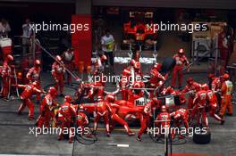 01.10.2006 Shanghai, China,  Michael Schumacher (GER), Scuderia Ferrari, 248 F1, pitstop - Formula 1 World Championship, Rd 16, Chinese Grand Prix, Sunday Race