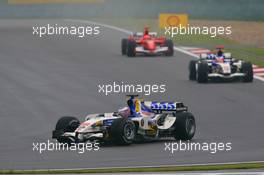 01.10.2006 Shanghai, China,  Jenson Button (GBR), Honda Racing F1 Team, RA106 and Rubens Barrichello (BRA), Honda Racing F1 Team, RA106  - Formula 1 World Championship, Rd 16, Chinese Grand Prix, Sunday Race