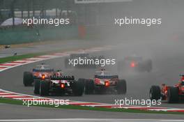 01.10.2006 Shanghai, China,  Sakon Yamamoto (JPN), Super Aguri F1 Team, SA06 and Ralf Schumacher (GER), Toyota Racing, TF106 - Formula 1 World Championship, Rd 16, Chinese Grand Prix, Sunday Race