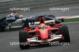 01.10.2006 Shanghai, China,  Felipe Massa (BRA), Scuderia Ferrari leads Mark Webber (AUS), Williams F1 Team - Formula 1 World Championship, Rd 16, Chinese Grand Prix, Sunday Race