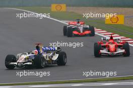 01.10.2006 Shanghai, China,  Rubens Barrichello (BRA), Honda Racing F1 Team, RA106 and Michael Schumacher (GER), Scuderia Ferrari, 248 F1  - Formula 1 World Championship, Rd 16, Chinese Grand Prix, Sunday Race