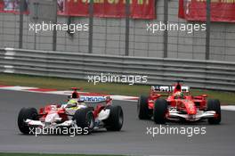 01.10.2006 Shanghai, China,  Ralf Schumacher (GER), Toyota Racing leads Felipe Massa (BRA), Scuderia Ferrari - Formula 1 World Championship, Rd 16, Chinese Grand Prix, Sunday Race