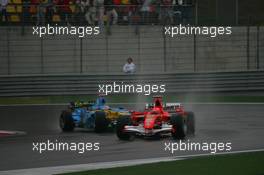 30.09.2006 Shanghai, China,  Michael Schumacher (GER), Scuderia Ferrari, 248 F1 and Fernando Alonso (ESP), Renault F1 Team, R26 - Formula 1 World Championship, Rd 16, Chinese Grand Prix, Saturday Qualifying