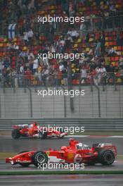 30.09.2006 Shanghai, China,  Michael Schumacher (GER), Scuderia Ferrari, 248 F1 and Felipe Massa (BRA), Scuderia Ferrari, 248 F1 - Formula 1 World Championship, Rd 16, Chinese Grand Prix, Saturday Qualifying
