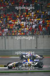 30.09.2006 Shanghai, China,  Jenson Button (GBR), Honda Racing F1 Team, RA106 and Rubens Barrichello (BRA), Honda Racing F1 Team, RA106 - Formula 1 World Championship, Rd 16, Chinese Grand Prix, Saturday Qualifying