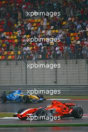 30.09.2006 Shanghai, China,  Tiago Monteiro (POR), Spyker MF1 Racing, Toyota M16 and Fernando Alonso (ESP), Renault F1 Team, R26 - Formula 1 World Championship, Rd 16, Chinese Grand Prix, Saturday Qualifying