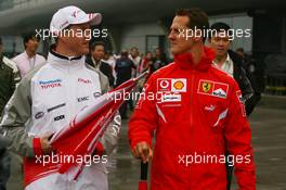 01.10.2006 Shanghai, China,  Ralf Schumacher (GER), Toyota Racing and Michael Schumacher (GER), Scuderia Ferrari - Formula 1 World Championship, Rd 16, Chinese Grand Prix, Sunday