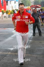 12.05.2006 Granollers, Spain,  Michael Schumacher (GER), Scuderia Ferrari, running through the paddock - Formula 1 World Championship, Rd 6, Spanish Grand Prix, Friday