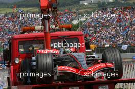 14.05.2006 Granollers, Spain,  the car of Juan-Pablo Montoya (COL), Juan Pablo, McLaren Mercedes is taken back to the pits after a spin - Formula 1 World Championship, Rd 6, Spanish Grand Prix, Sunday Race