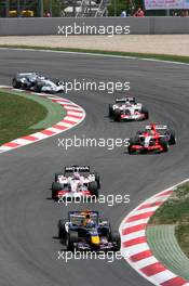 14.05.2006 Granollers, Spain,  David Coulthard (GBR), Red Bull Racing leads Franck Montagny (FRA), Super Aguri F1 - Formula 1 World Championship, Rd 6, Spanish Grand Prix, Sunday Race