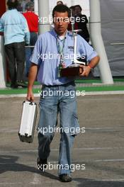 14.05.2006 Granollers, Spain,  Circuit staff bring Trophies into the Formula 1 paddock - Formula 1 World Championship, Rd 6, Spanish Grand Prix, Sunday