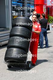 11.05.2006 Granolles, Spain,  A Ferrari Mechanic with Bridgestone tyres - Formula 1 World Championship, Rd 6, Spanish Grand Prix, Thursday